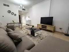 Furnished 2BR in Yasmeen Towers Ajman, bills, internet, &amp; parking included.