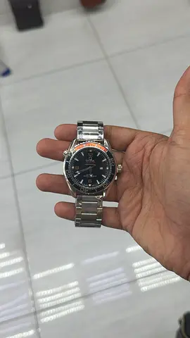 My mens stainless steel wristwatch with black dial (used)