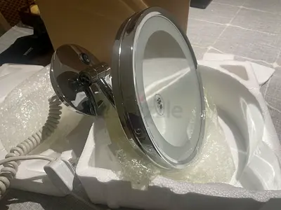 Illuminate Your Space with a Stylish Wall-Mounted Mirror