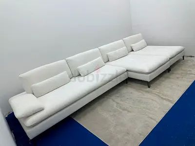 Selling rochebobois lshape white sofa