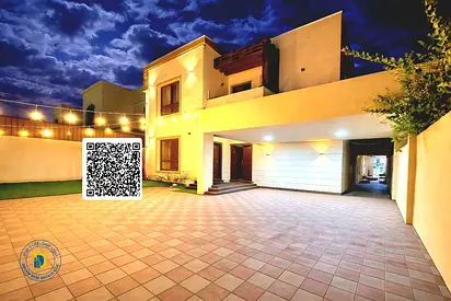 For sale: Large villa on a main street in Al Muwaihat area. Price includes water, electricity, and air conditioning.