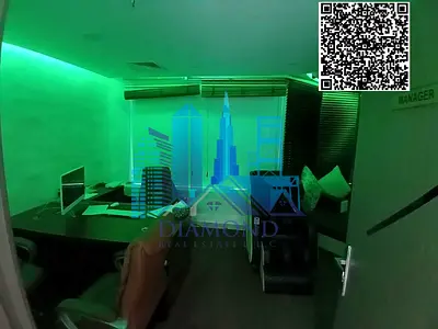 An office for annual rent, divided and ready for immediate occupancy, in Horizon Towers, Ajman.