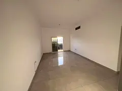 A two-bedroom apartment with a master living room is available for annual rent in Al Rawda, Ajman. L