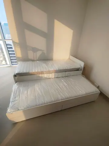 Ikea slakt bed frame with under bed and 2 storage drawers underneath with 2 Ikea mattresses