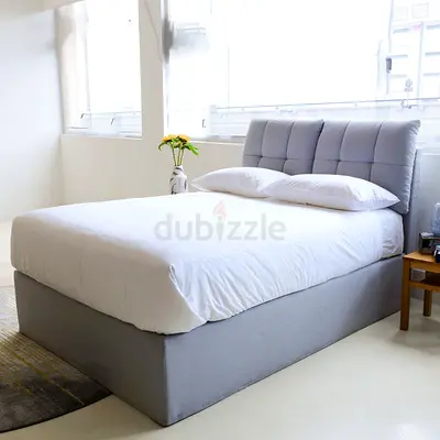 2 cushioned headboard twin storage bed