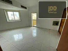 Studio in Al Rashidiya 3 behind Grand Mall, separate kitchen, balcony, central AC, built-in wardrobe