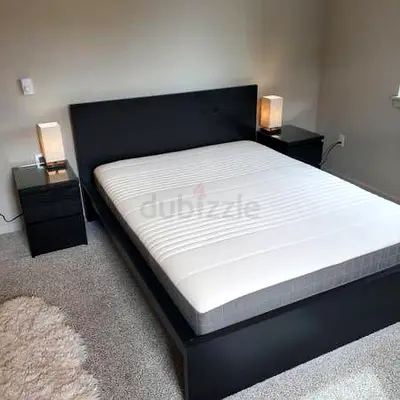 My black platform bed with mattress