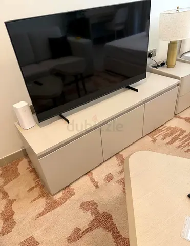 Beige 3-door low TV cabinet — modern entertainment unit (good condition)
