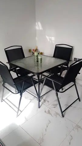 4-piece square glass-top dining table