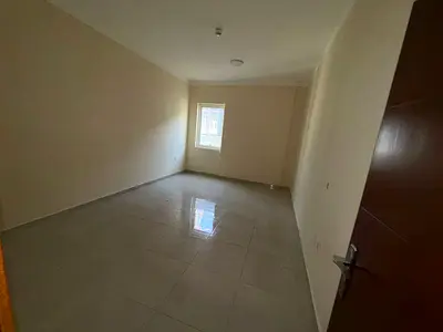 1BR + living with maid room in Al Jurf 2, central A/C & gas, near Ajman Court & University, AED 35k/4 payments.