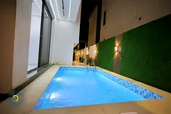 Prime location in Al Zahia, luxury villa with 5 bedrooms, roof terrace, and swimming pool, registrat