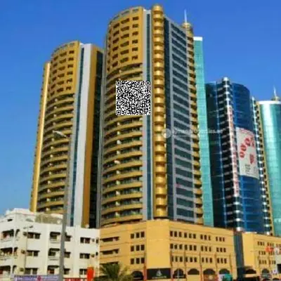 For sale in Ajman, one-bedroom apartment in Horizon Towers with parking. Excellent price: AED 380,000 cash.