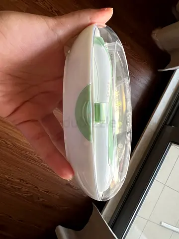 Brand new Hakaa electric nail trimmer with 4 replacement pads, meadow color