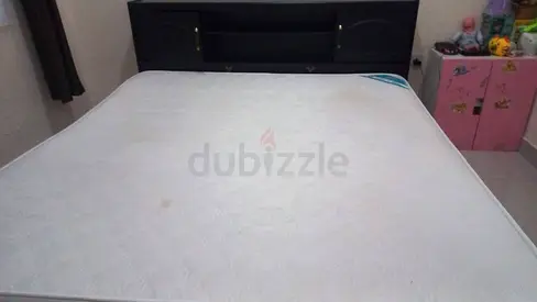 Double bed with mattress and headboard shelf - used