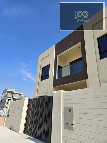 For sale: Super deluxe villa in Al Helio 2, Ajman, 3 floors, 5 bedrooms, private pool, elevator, central AC, 4,200 sq.ft, AED 2,650,000.