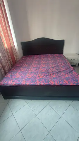 Im selling my double wooden bed with headboard - used, good condition