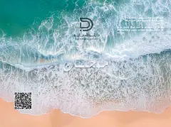 Own a luxury studio in Mogan Project on Ajman Corniche with stunning views, high-end finishes, and a