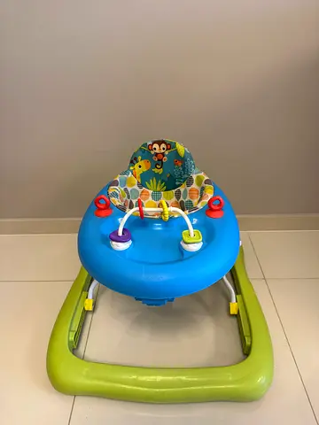 My baby’s activity walker with padded seat and toy ring — used, good condition