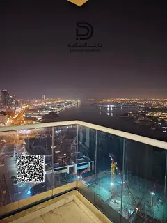 Own a 2-bedroom apartment with a living room in Al Waha Towers, featuring high-end finishes, a spaci