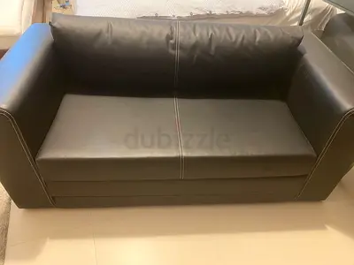 Black faux leather 2-seater sofa — great  condition