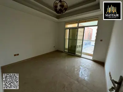 A spacious three-room apartment with a maid's room, large area, and balcony in Al Jurf 2. Excellent location and reasonable price.
