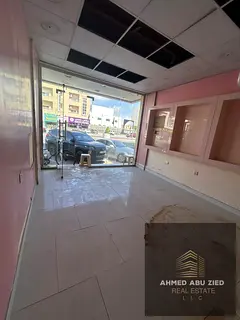 Prime retail shop for annual rent on Sheikh Ammar Street in Al Rawda 3, strategic high-traffic locat
