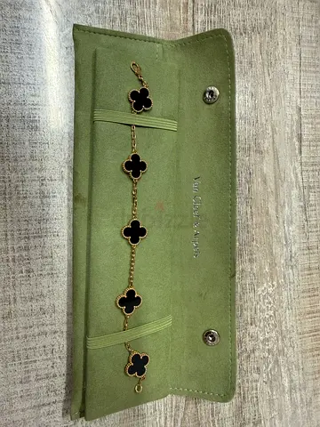 Gold-tone bracelet with black clover motifs (Van Cleef style) with certificate and box available