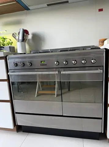 Smeg latest model dual fuel and dual oven cooker 90cm top gas oven electric