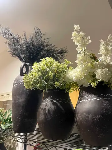 Elegant Black Decorative Ceramic Vases with Floral Arrangements