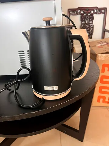 Black matte electric kettle with wooden base — used, works perfectly