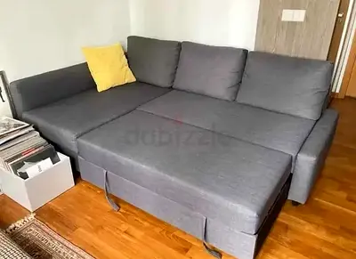 Grey L-shaped sofa bed good condition