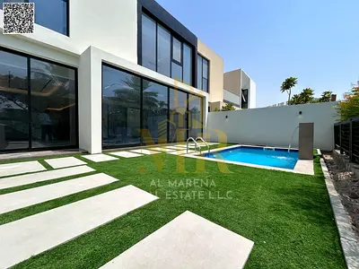 A villa with all-inclusive price (electricity, water, and air conditioning) on ​​the main street, ready to move in, in one of Ajman's most prestigious