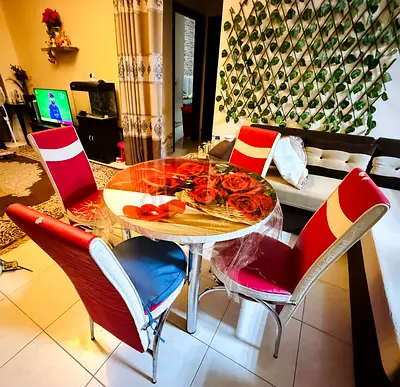 Round Dining Table with Red Chairs
