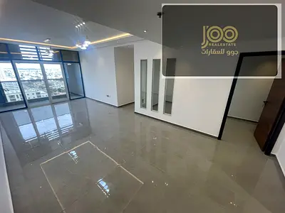 Super deluxe 2-bedroom apartment in Al Naeemiya 3, Khalifa Street, 2 bathrooms, balcony, open view, spacious, AED 60,000, 4–5 payments, AED 5,000 depo