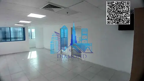 A large office space, divided into two rooms and a hall, is available for annual rent in Falcon Towers, Ajman.