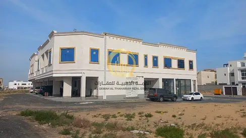 Investment opportunity in Al-Houshi: building for sale, corner on two streets and directly on Mleiha Street