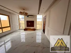 Beautiful villa with 5 master bedrooms, a majlis, a living room with a large balcony, a maid's r