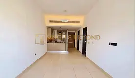 Rigel Apartments JVC | Pool &amp; Courtyard View | Store Room