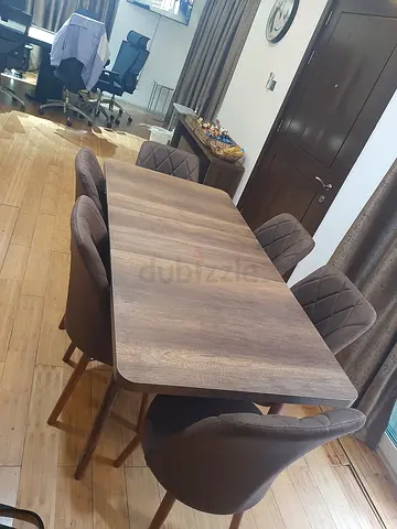 Brand new dining table with chair available