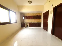 NO DEPOSIT CASH STUDIO BIG KITCHEN ON ROAD BUILDING IN MUWAILEH