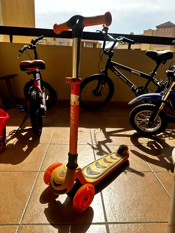Orange 3-wheel kids scooter - used, good condition