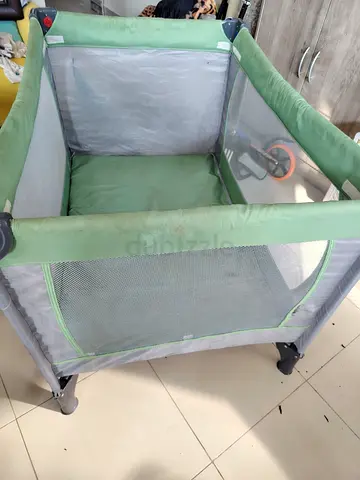 Foldable baby playpen / play yard (green) - used
