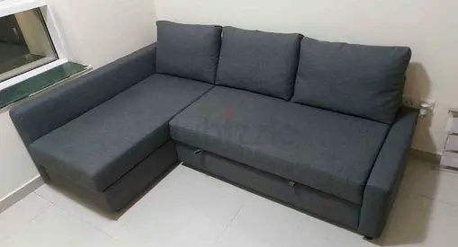 Im selling my dark grey L-shaped sofa bed  with storage - good condition