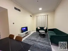 Luxury one-bedroom apartment with a living room and balcony offering an open view. Ajman, Al Muwaiha