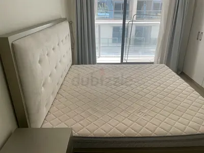 Comfortable Queen Size Bed and mattress and side table