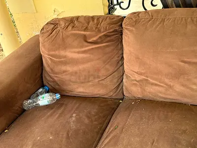 A free couch and toaster in bad condition