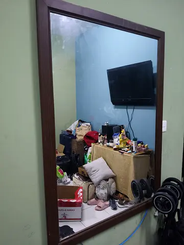 Large wall mirror with brown wooden frame - used