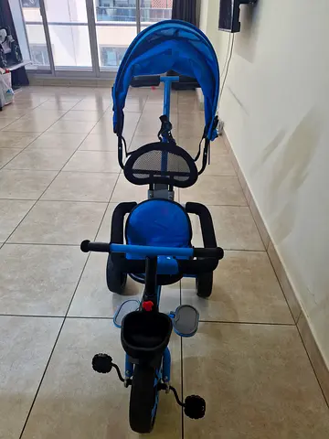 Child push tricycle with parent handle and canopy (lightly used)
