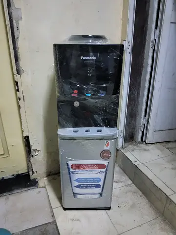 Top load water dispenser