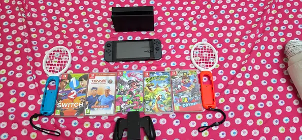Nintendo Switch with dock, Joy‑Cons, grip and assecories with 5 games
